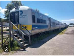 Photo of an LIRR train in a rail yard.